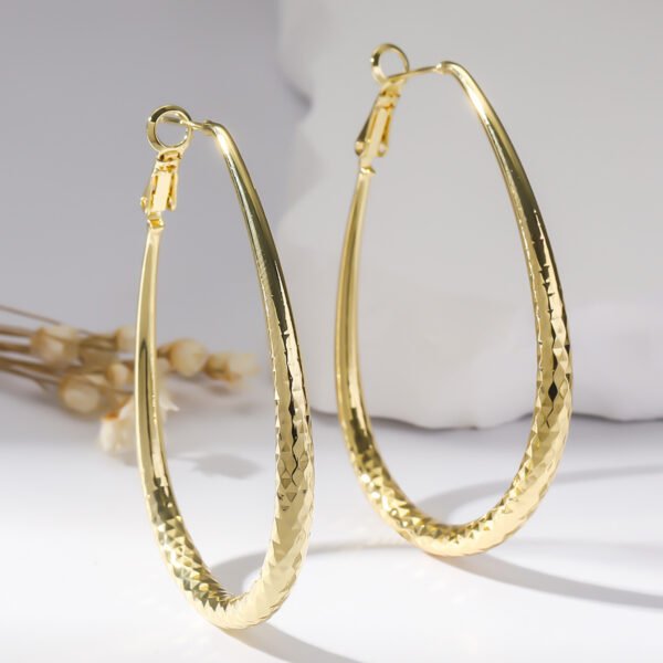 Golden Glossy Spring Fastener Egg-shaped Earrings Hypoallergenic Copper - Image 2
