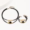 Modern Elegance  Black & Silver Leather Choker Necklace And Bracelet Set - Image 2