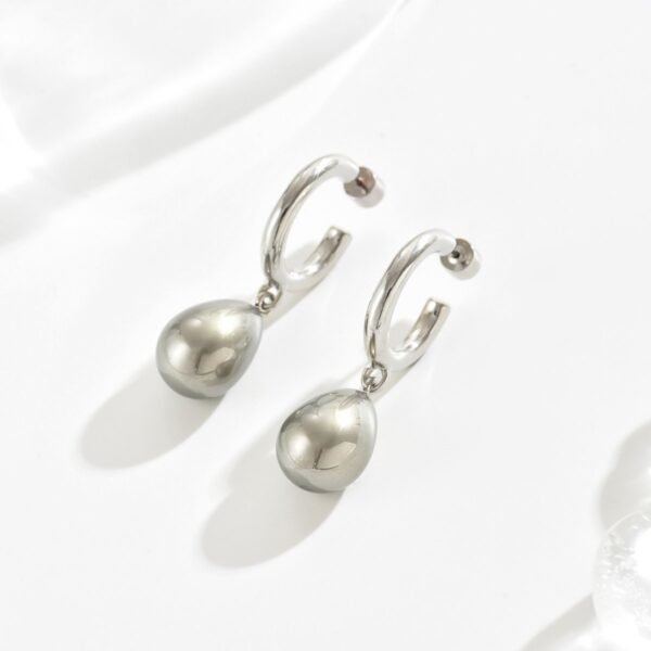 Elegant Silver-Tone Hoop Earrings With Teardrop Pendant - Image 3