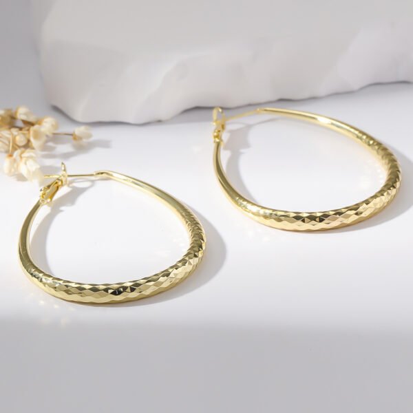 Golden Glossy Spring Fastener Egg-shaped Earrings Hypoallergenic Copper - Image 4